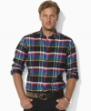 Putting a preppy twist on a conventionally rugged look, this relaxed-fitting plaid shirt is rendered in soft cotton with Ralph Lauren's embroidered pony adorning the chest.