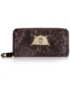 Get organized in the most exotic way with this python print velour wallet from Juicy Couture, featuring signature hardware and leather trim. Ideally sized to slip inside a handbag, it boasts plenty of pockets and compartments for all the essentials.