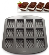 What the shouting is all about! Kick up your kitchen cred with this ice cream sandwich pan, which prepares this cool favorite with professional ease. Use the included recipe to whip up a batch of 12 mini cakes, pick your favorite ice cream center and have 6 tasty treats in no time at all-the kids are sure to come running! 10-year limited warranty.