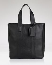 On the go style from BOSS Black, the leather tote bag with top handles, zip closure, as well as the convenience of interior zip pocket cell phone holder.