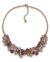 Shake up your look with this clustered necklace, by Carolee. Glass pearls and genuine cherry quartz beads combine on this warm-hued design. Crafted in imitation rhodium-plated mixed metal. Approximate length: 18 inches + 2-inch extender.