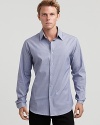 Subtle stripes, barrel cuffs, and a touch of stretch take this woven shirt by Theory from the office to evening.