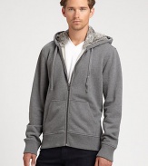 Soft rabbit fur lines the hood of this classic hoodie, finished in comfortable cotton for extra warmth.Zip frontAttached drawstring hoodKangaroo pocketsRibbed knit cuffs and hemCottonMachine washImportedFur origin: China