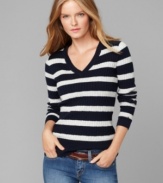 Cozy up to this cable-knit sweater by Tommy Hilfiger. A luxe and preppy look has never been so affordable!