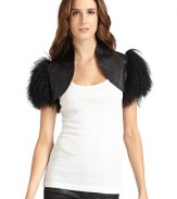 THE LOOKShearling trimOpen frontTHE FITAbout 10 from shoulder to hemTHE MATERIALMongolian curly lamb furFully linedCARE & ORIGINDry cleanImportedFur origin: ChinaModel shown is 5'10 (177cm) wearing US size Small. 