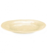 Celebrated chef and writer Sophie Conran introduces dinnerware designed for every step of the meal, from oven to table. A ribbed texture gives this tan platter from Portmeirion the charm of traditional hand-thrown pottery.