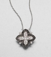 From the Soho Collection. This clover-shaped design features white sapphires and black spinels on a sterling silver link chain. White sapphiresBlack spinelSterling silverLength, about 16Pendant size, about .7Lobster clasp closureImported 