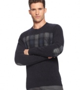 Armani Jeans takes all the elements of a prep-style pullover-elbow patches, plaid, crew-neck-and puts them on a sweater that comes out looking totally original.