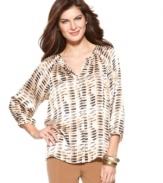 This no-fuss blouse features a relaxed silhouette and modern print for everyday chic, from Ellen Tracy.