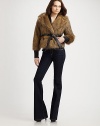 Lush faux fur takes on vintage appeal in this cropped double-breasted silhouette.Shawl collar Double-breasted button front Princess seams Self-belt Inseam pockets About 22¼ from shoulder to hem 70% modacrylic/30% acrylic Dry clean Imported