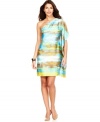 A one-shoulder silhouette with a draped sleeve adds drama to this silky, printed Calvin Klein dress.