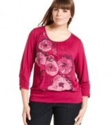 Snag a standout casual look with Style&co.'s three-quarter-sleeve plus size top, showcasing an embellished print.