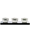 Accent your home with these beautiful votives from Baccarat. Black lacquer base adorned with 3 full-lead crystal votives.