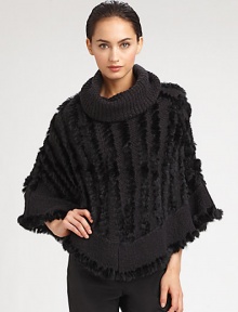 A sophisticated style with luxurious dyed rabbit fur accenting a warm knitted design. Oversized turtleneckCurved hemAbout 35 from shoulder to hem70% acrylic/30% woolSpecialist dry cleanImportedFur origin: China 