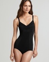 A sleek bodysuit with mesh detail along a V-neckline.