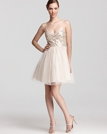 Aqua's sweet, sequined dress lends a youthful look with a ballerina-inspired tulle skirt.