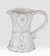 Bring the outdoors inside with a smaller, hand-finished stoneware pitcher beautifully detailed with a scrolling design that celebrates the splendor and romance of the world's most beautiful gardens. Chip resistant 5 high Dishwasher safe Imported