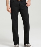 The Standard in Blackout is a classic straight leg fit with a straight waistband and a button fly. It is slim and parallel from the knee to the bottom opening and sits low on the waist. 9 oz stretch denim fabrication. A black warp and weft create a solid, rich black color. Whiskers and wrinkling at the knee and behind the knee create a worn-in appeal, while all black hardware and rivets keep this look polished and clean. The back pocket features 7 For All Mankind's squiggle back pocket design. Button fly.