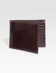 EXCURSIVELY OURS.An elegant menswear standard is crafted in genuine lizard. One bill compartmentEight card slots4½ X 3½Imported