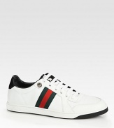 Lace-up sneaker with signature web and logo label on the tongue.Rubber soleMade in Italy