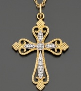 Glittering inspiration. This diamond cross necklace features round-cut diamond accents set in a 14k gold pendant. Approximate length: 18 inches. Approximate drop: 1-1/4 inches.