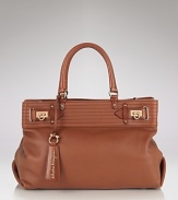 Just right for work or weekend, this soft leather tote captures the signature luxe Salvatore Ferragamo is know for.