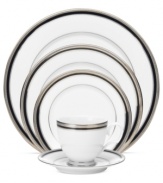 An instant classic, the Austin Platinum place setting from Noritake layers ribbons of black with patterned platinum bands and shimmering dots. White porcelain grounds the timeless dinnerware, a flawless choice for fine occasions.