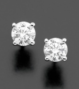 Fill every day with a touch of elegance. These pristine stud earrings feature round-cut diamond (1-1/2 ct. t.w.) set in 14k white gold.