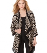 A paired-down silhouette emphasizes the graphic stripes on Calvin Klein's open-front cardigan. A soft fringe trim adds movement to the mix!