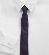 A simplistic design woven in smooth Italian silk.About 2 wideSilkDry cleanMade in Italy