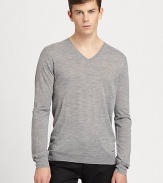 A simple v-neck sweater goes a long way in achieving great style and sophistication and this neatly-shaped rendition is no exception. Knitted from fine merino wool, this pullover is soft and lightweight, making it an ideal choice for seasonal layering.V necklineBanded cuffs and hemMerino woolDry cleanImported