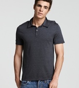 Casual and sporty, this classic polo shirt is knit in an undeniably soft cotton jersey.