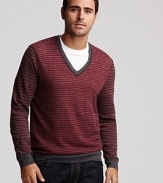 This BOSS Orange wool sweater boasts fine stripes in rich hues for season-perfect style.