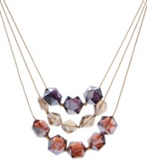 Fashionable faceted glass beads in complementary colors create this chic, triple-row necklace from Kenneth Cole New York. Crafted in gold tone mixed metal. Approximate length: 16 inches + 3-inch extender.