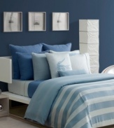 The Volturno comforter set from Lacoste utilizes mod lines and chic textures in an array of flowing blues. Ombré blue stripes cascade over an icy white ground on the top of this comforter while the reverse features a solid ombré pattern. Combine this design with signature quilted accents and pure white sheeting for a truly luxe look.