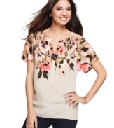 A soft, billowing fit offsets the chic floral print and edgy studs of Style&co.'s top.