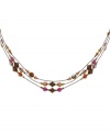 Red alert! A chic combination of crimson-hued crystals make 2028's triple-strand necklace ideally suited for fall fashion. Crafted in copper tone mixed metal and embellished with topaz and aurora borealis beads. Approximate length: 16 inches + 3-inch extender.