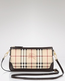 Wallet by day, clutch by night, this chic little Burberry wristlet is elegantly versatile.