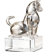 A beautiful way to ward off evil. Crafted in its typical alert pose, this zodiac dog figurine features clear and faceted Swarovski crystal on a base engraved with both English and Chinese seal script.