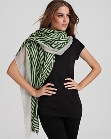 Infuse your look with on-trend style with this boldly printed scarf in plush cashmere from DIANE von FURSTENBERG.