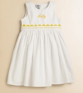 A classic look for adorable girls everywhere, shaped from soft cotton piqué with a ribbon waist and yellow rick-rack trim. Back button closure Gathered empire waist Cotton Machine wash Made in USA FOR PERSONALIZATION Select a quantity, then scroll down and click on PERSONALIZE & ADD TO BAG to choose and preview your personalization options. Please allow 2 weeks for delivery.