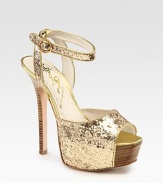 Uplifted by a stacked heel and partially covered platform, this glitzy metallic leather go-to has an adjustable ankle strap and a peep toe. Stacked heel, 5½ (140mm)Covered platform, 2 (50mm)Compares to a 3½ heel (90mm)Metallic leather and glitter-coated leather upperLeather lining and solePadded insoleImportedOUR FIT MODEL RECOMMENDS ordering one half size up as this style runs small. 