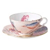 Step into a delightful garden party with Wedgwood's whimsical Cuckoo collection. Inspired by nature, this richly accented tea cup and saucer adds a flourish of color to your table with sophisticated and lively style.