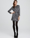 Downtown dazzle and an edgy snake print meet a sleek silhouette on this Pippa sequin dress. Pair it with bold ankle boots and opaque tights for a modern contrast.