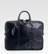 A sophisticated briefcase is designed with signature GG imprimé and tonal leather trim. Double-zip closure with lock Double handles Nickel hardware Interior zip pocket Nylon lining 16W X 12.2H X 4D Made in Italy 