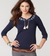 Lucky Brand Jeans offers a tee with charming peasant top styling for a fun look with a boho twist! Embroidery and tassels at the neckline add an artisan-inspired touch, too!