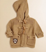 Featuring quintessential prep school style, this knit cardigan is made complete with an attached hood and wooden-toggle closures along the front.Attached hoodLong sleeves with adjustable button tabFront toggle closureButton-flap patch pockets70% cotton/30% wool spandexDry cleanImported Please note: Number of buttons may vary depending on size ordered. 