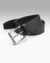 Prada logo buckle with etched detail and saffiano leather strap. Black has black stitching and black interior About 1½ wide Made in Italy 