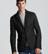 A sophisticated quilted sport coat from Burberry London elevates your look to one of timeless appeal.