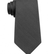 Power up for the day in this all-business silk tie from DKNY.